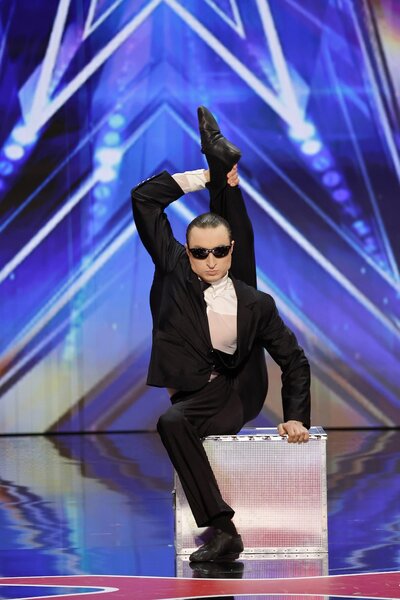 Aleksandr Batuev performs onstage on America's Got Talent Episode 1907.