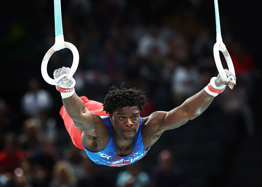 Fred Richard performing on the rings at the 2024 Olympics.