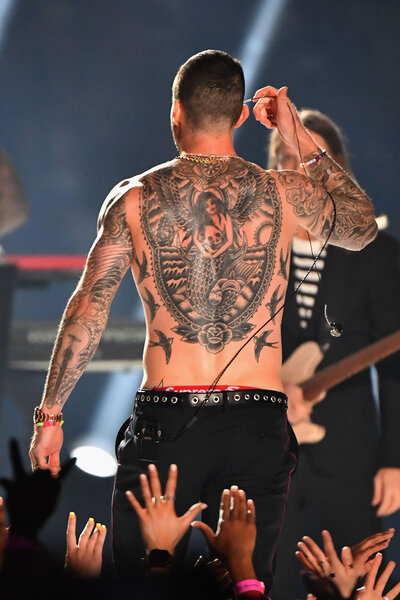 Adam Levine performs shirtless during the Pepsi Super Bowl LIII Halftime Show