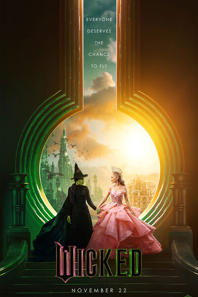 Elphaba and Glenda hold hands in a poster for the movie Wicked