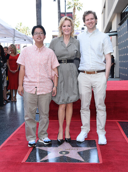 Jean Smart, Forrest Gilliland, and Connor Gilliland posing together at the Hollywood Walk of Fame.