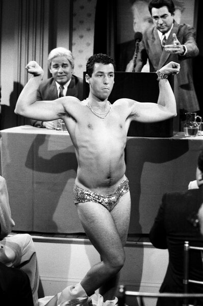 Hector Camacho (Adam Sandler) flexes in a speedo during an SNL sketch.