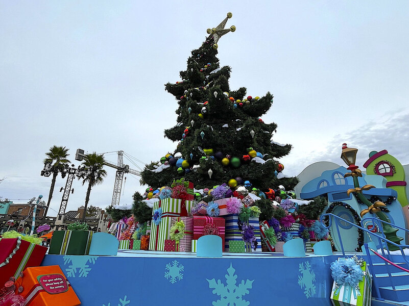 A christmas tree and holiday decor at Super Nintendo World.