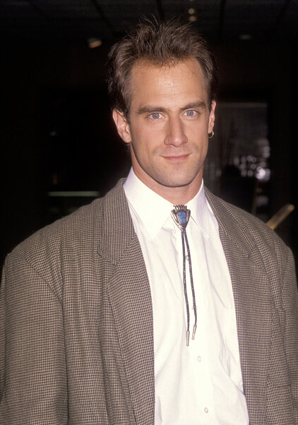 Chris Meloni in the 90's wearing a hoop earring.