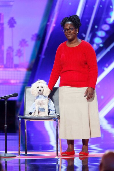 Mia Moore with her owner Edna on stage during America's Got Talent Season 12, Episode 2.