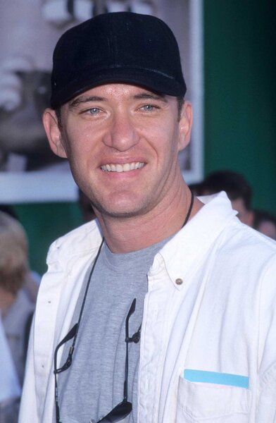 Jim Hanks smiling at the premiere of Toy Story 2.