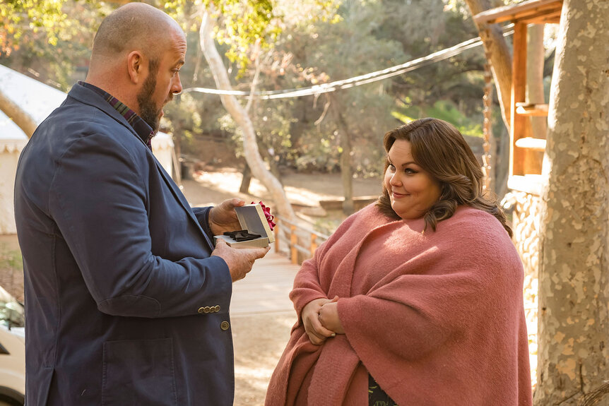 Kate and Toby outside, looking lovingly at each other