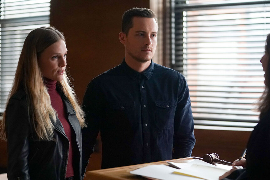 Jay and Hailey standing in front of a judge