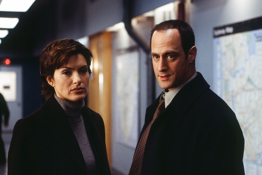 Olivia Benson and Elliot Stabler stand together