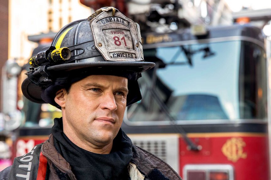 Actor Jesse Spencer in his firefighter gear on Chicago Fire.