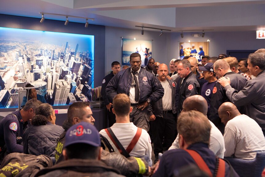 Chief Boden (Eamonn Walker) with members of Firehouse 51.