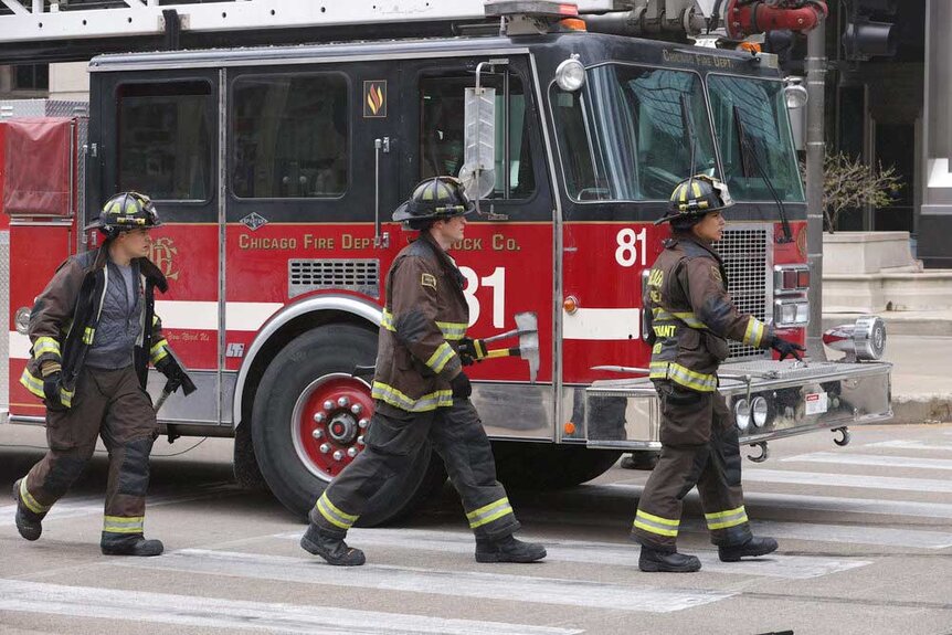 Blake Gallo (Alberto Rosende), Carver (Jake Lockett), and Stella Kidd (Miranda Rae Mayo) in a scene from Chicago Fire.