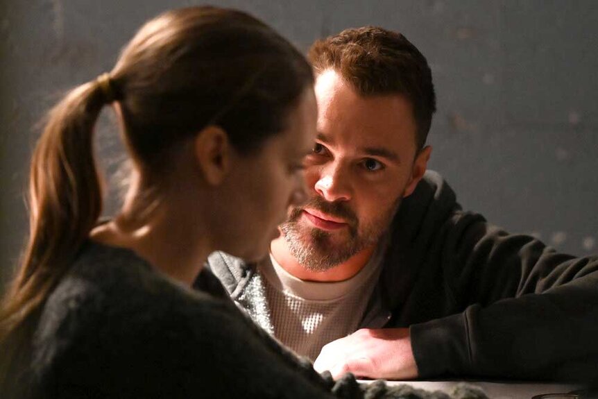 Samantha Beck (Caitlin Mehner) and Adam Ruzek (Patrick John Flueger) in a scene from Chicago P.D.