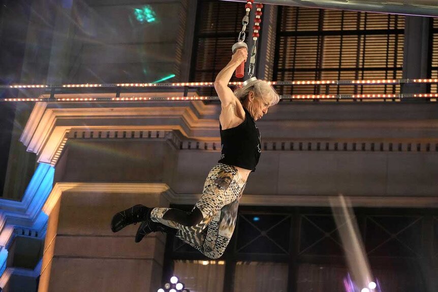 Ginny MacColl competing on American Ninja Warrior.