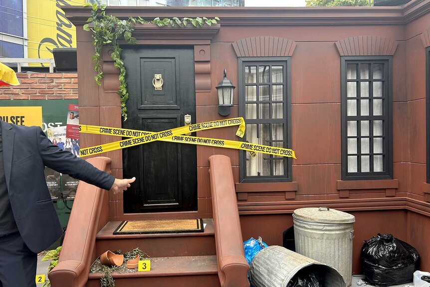 Police tape across a door at the Quantum Leap Activation at SDCC 2023