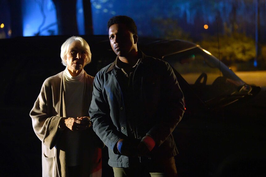 Chris MacNeil (Ellen Burstyn) and Victor Fielding (Leslie Odom, Jr.) in The Exorcist: Believer.