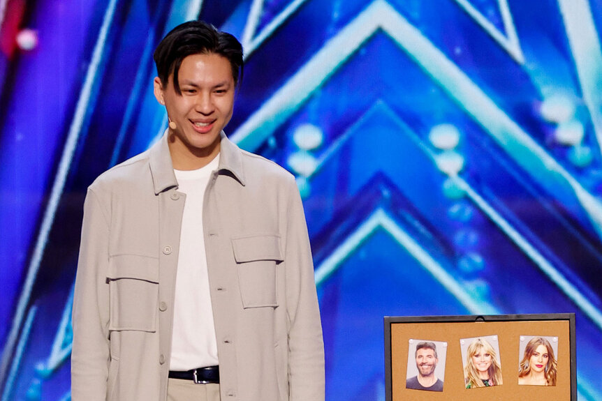 Kevin Li performs on the AGT stage