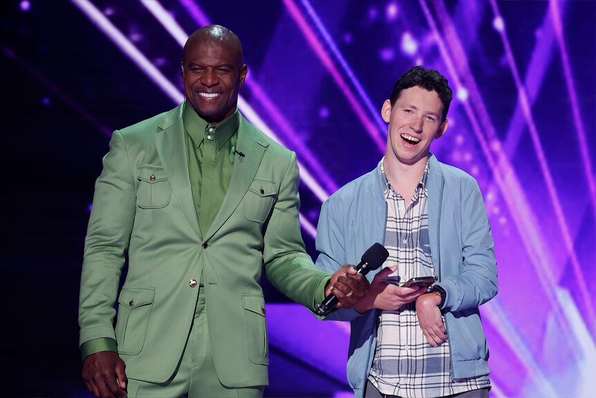 Ahren Belisle stands with Terry Crews