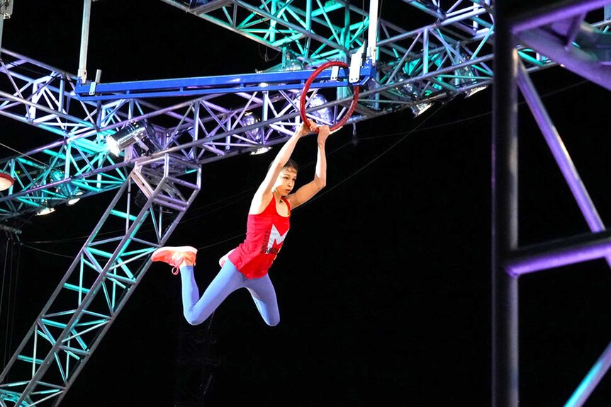 Madelyn Madaras competing on American Ninja Warrior.