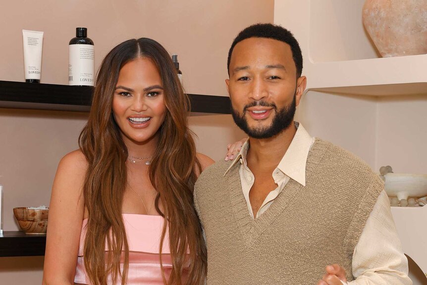 Chrissy Teigen and John Lennon attend an event.