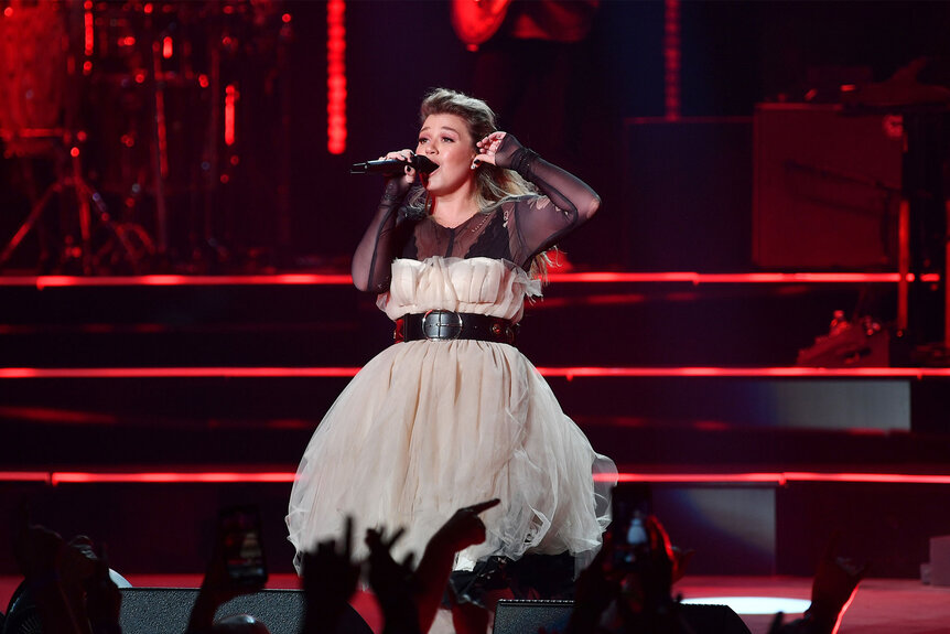 Kelly Clarkson performing onstage