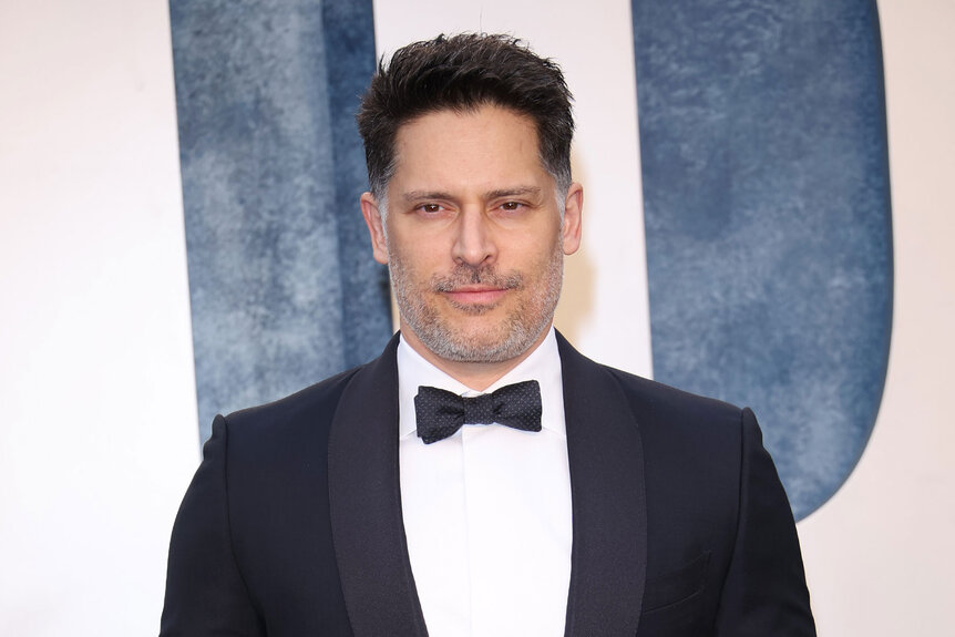 Joe Manganiello wearing a tuxedo attending Vanity Fair Oscar Party