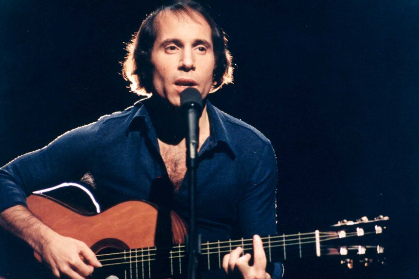 Paul Simon performing on Saturday Night Live.