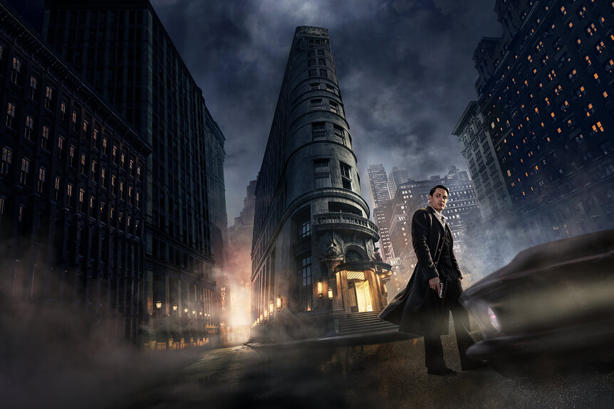 Winston Scott stands in front of a building in The Continental: From The World Of John Wick