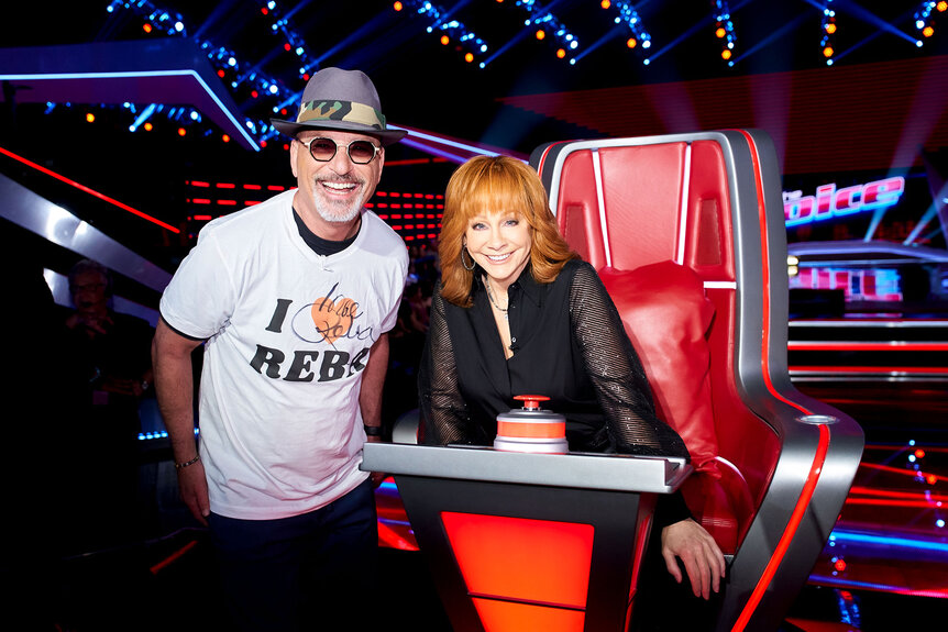 Howie Mandel and Reba Mcentire smile together during the Season 24 The Blind Auditions Part 2