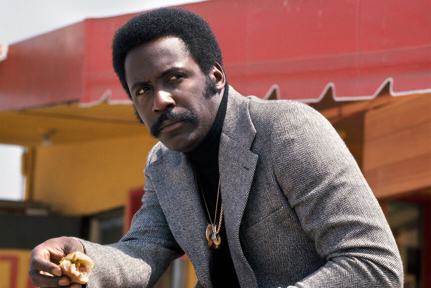 Shaft (Richard Roundtree) looks off camera