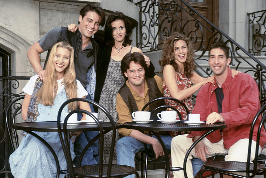 The cast of friends pose for a promo shoot