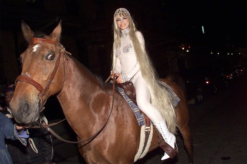 Heidi Klum attends her Halloween party in costume in 2001