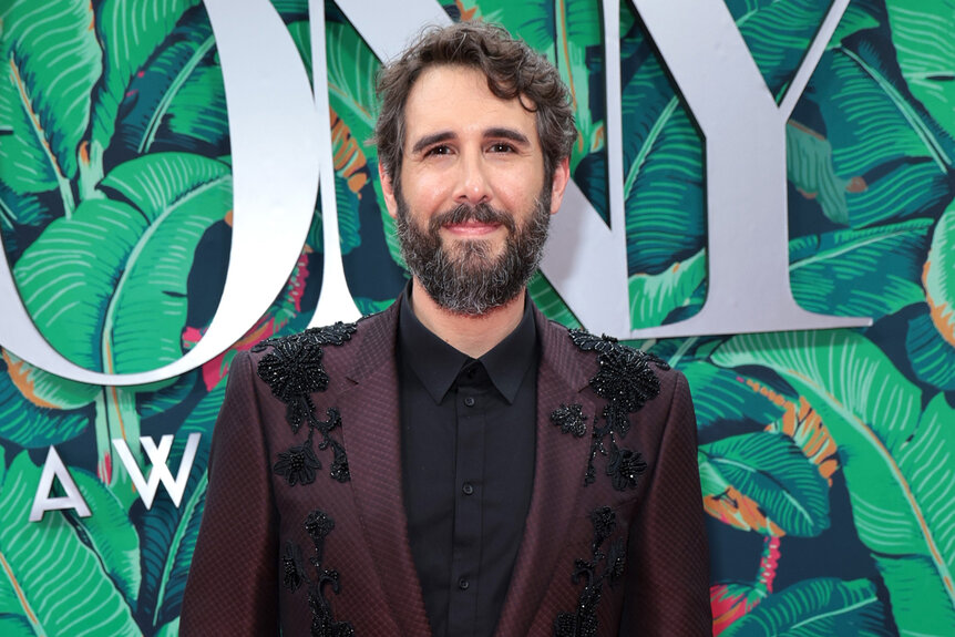 Josh Groban smiles on the red carpet at the 2023 Tony Awards