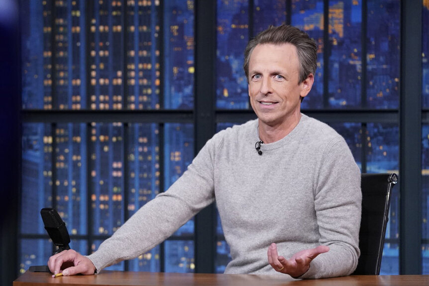 Seth sits at his desk during Late Night With Seth Meyers episode 1432