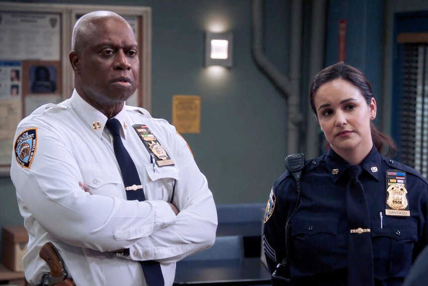 Andre Braugher as Raymond Holt, Melissa Fumero as Amy Santiago