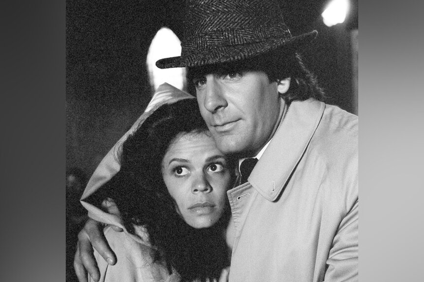 Deborah Pratt and Scott Bakula embrace