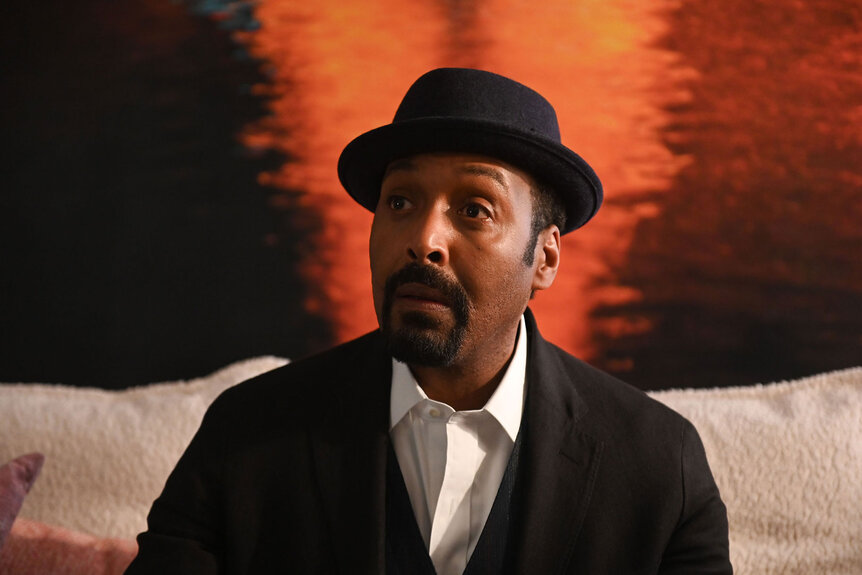 Alec Mercer (Jesse L. Martin) looks at someone off camera