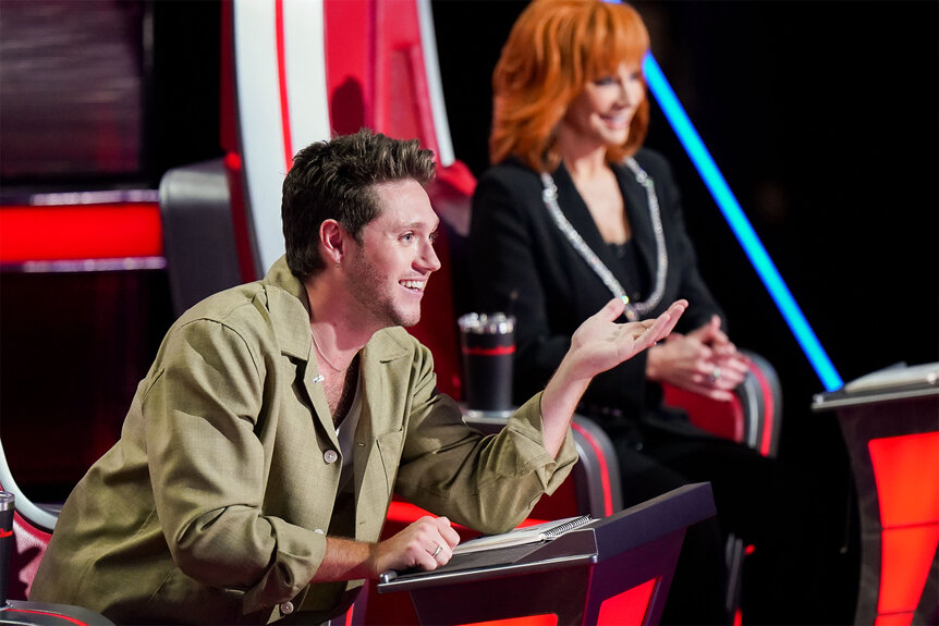 Niall Horan sits at his coaches chair on The Voice Episode 2418