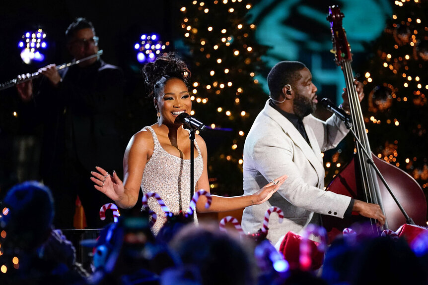 Keke Palmer sings on stage during Christmas In Rockefeller Center