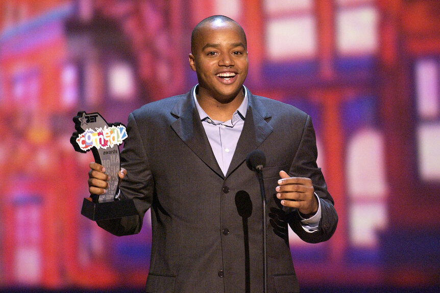 Donald Faison accepts an award at the 2004 BET Comedy Awards