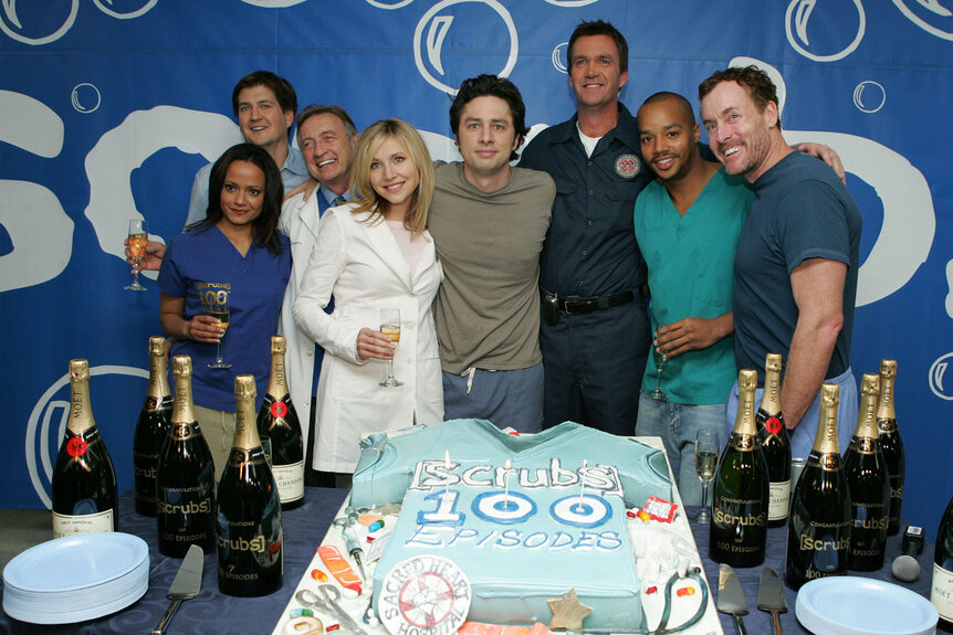 Judy Reyes, producer Bill Lawrence, Ken Jenkins, Sarah Chalke, Zach Braff, Neil Flynn, Donald Faison and John C. McGinley celebrate the 100th episode of "Scrubs"