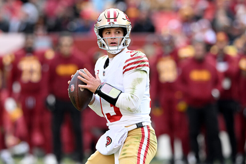 Brock Purdy of the San Francisco 49ers during a play on the field