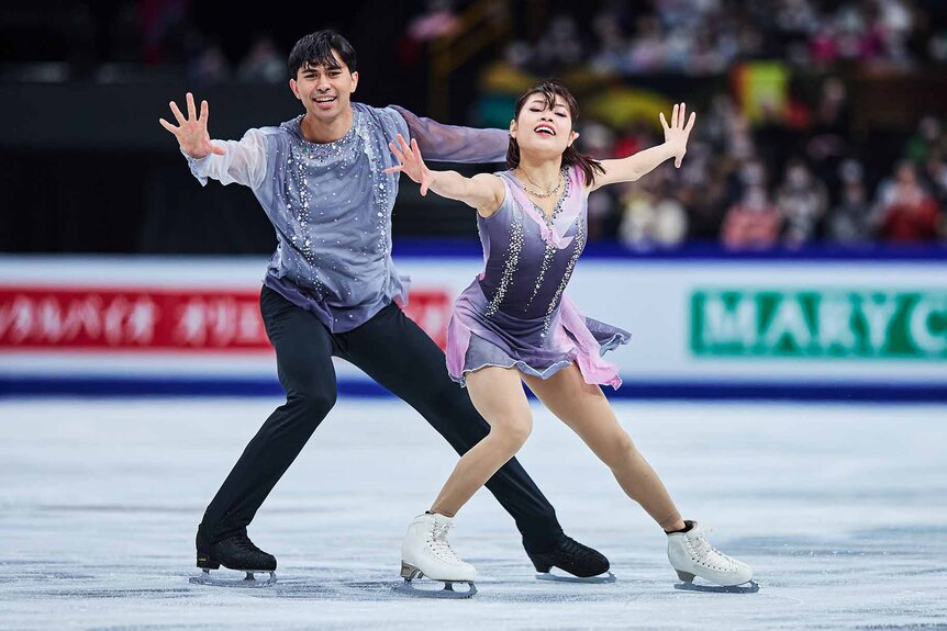 Emily Chan and Spencer Akira Howe dance together on ice.