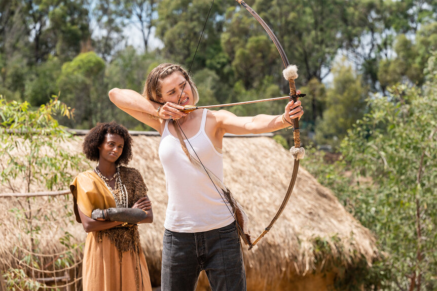 Leyla watches Izzy shoot an arrow on La Brea Episode 302.