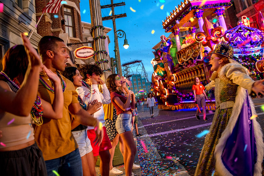 A Universal Orlando Mardi Gras performer sings to the crowd