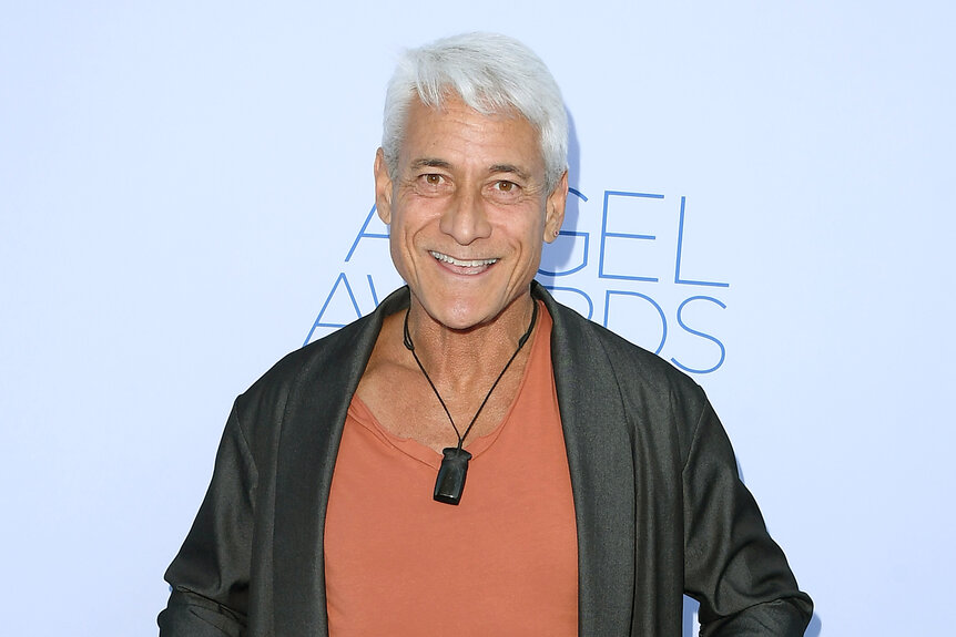 Greg Louganis on the red carpet for the Project Angel Food's 2023 Angel Awards