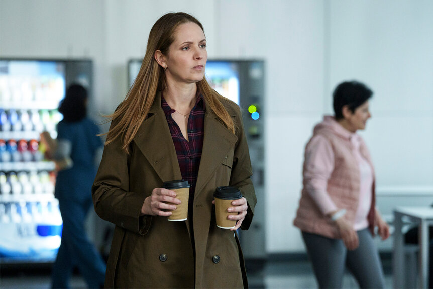 FBI Special Agent Shannah Sykes holds coffee on Law and order SVU