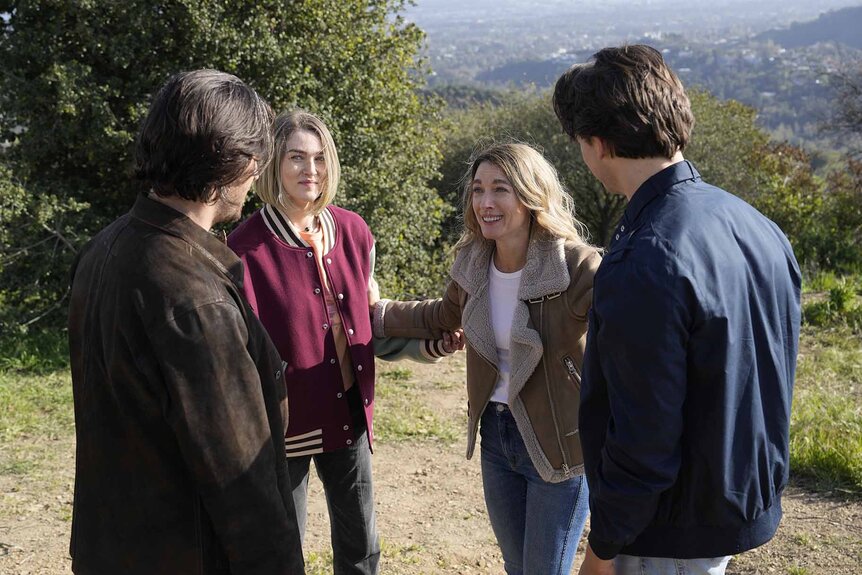 Gavin, Izzy, Eve, and Josh have a discussion outside in La Brea Episode 306.