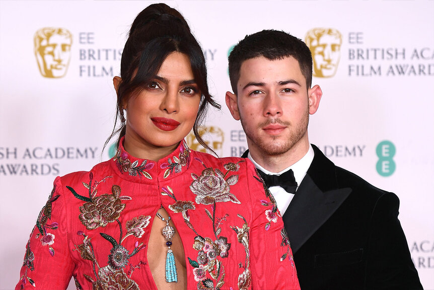 Priyanka Chopra and Nick Jonas pose for a photo at the EE British Academy Film Awards 2021