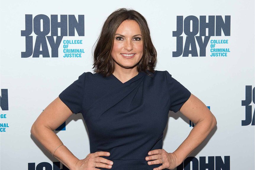 Mariska Hargitay poses in a navy dress.